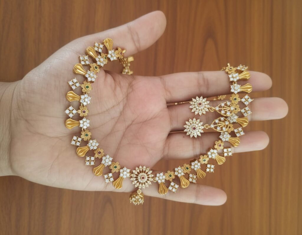 white and gold ad necklece set